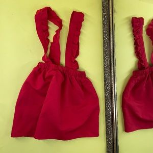 RUFFLED RED SUSPENDER SKIRT (7Y - GIRLS)